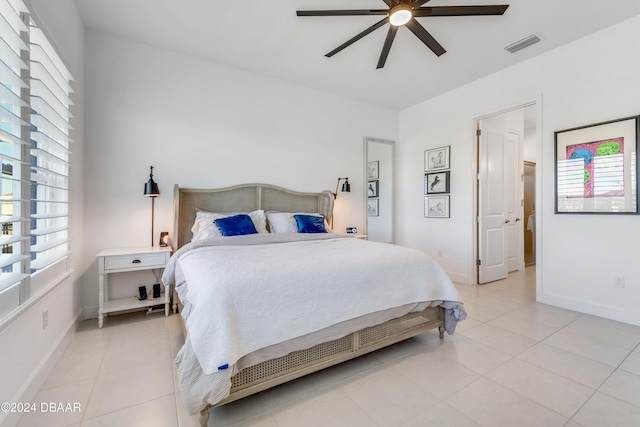 bedroom featuring ceiling fan and light tile patterned flooring