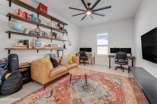 tiled living room featuring ceiling fan