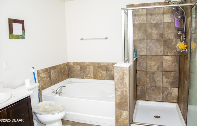 full bathroom with toilet, a stall shower, vanity, and a bath