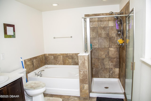 bathroom with toilet, a garden tub, a shower stall, and vanity