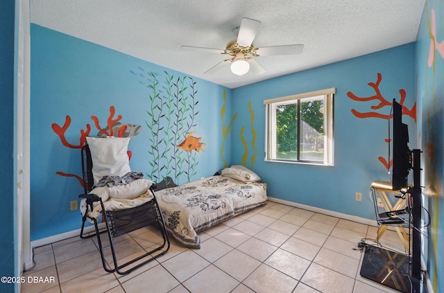 10 Lake Forest Cir N, Palm Coast, FL 32137 - bedroom with light tile patterned floors, baseboards, a ceiling fan, and a textured ceiling