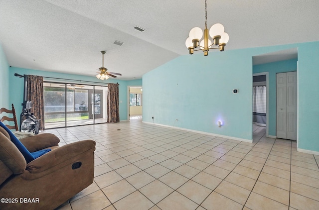 10 Lake Forest Cir N, Palm Coast, FL 32137 - living area with visible vents, baseboards, vaulted ceiling, and light tile patterned floors