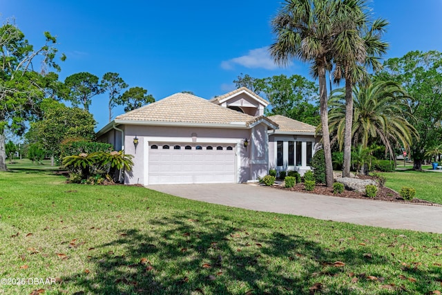 ranch-style home with an attached garage, stucco siding, and a tile roof