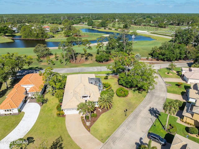 birds eye view of property with a residential view, view of golf course, and a water view