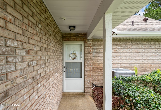 entrance to property featuring central AC