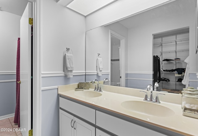 bathroom featuring vanity and tile patterned floors