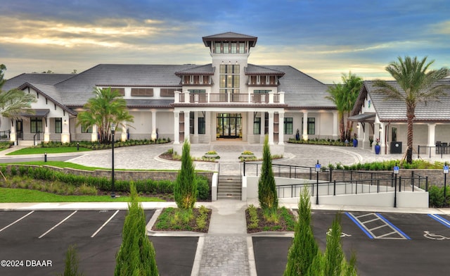 view of outdoor building at dusk