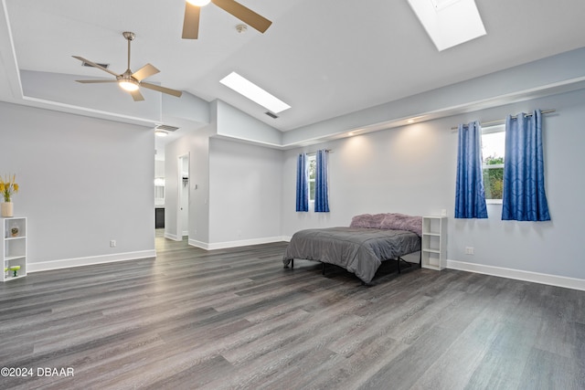 bedroom featuring vaulted ceiling, ceiling fan, and dark wood-type flooring