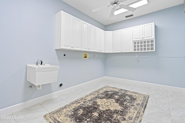 laundry room featuring electric dryer hookup, cabinets, sink, washer hookup, and ceiling fan