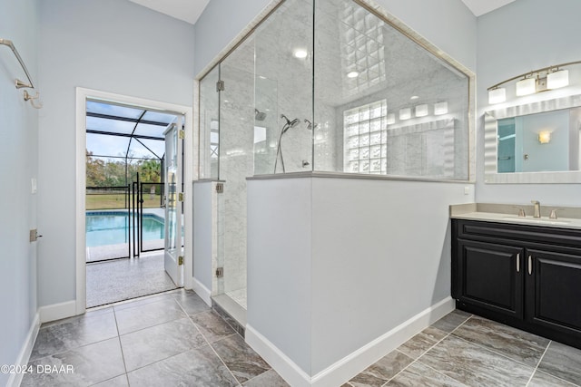 bathroom with vanity and a shower with shower door