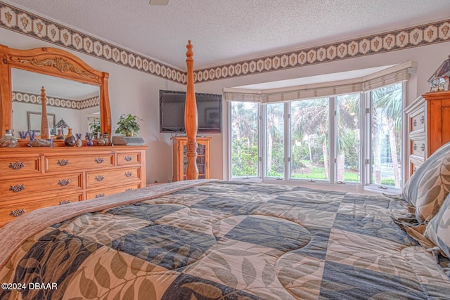 bedroom with a textured ceiling