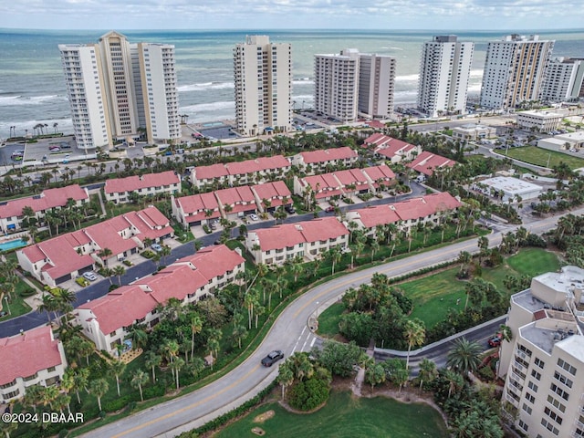 aerial view featuring a water view and a view of city