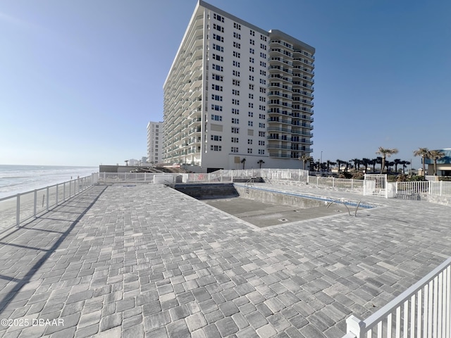 exterior space featuring a patio and fence