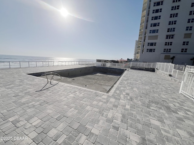 view of patio / terrace featuring a water view