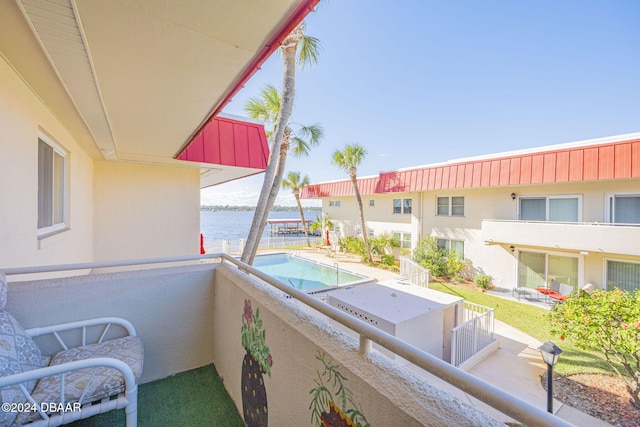 2801 N Halifax Ave N Unit 238, Daytona Beach, FL 32118 - balcony featuring a water view and view of pool