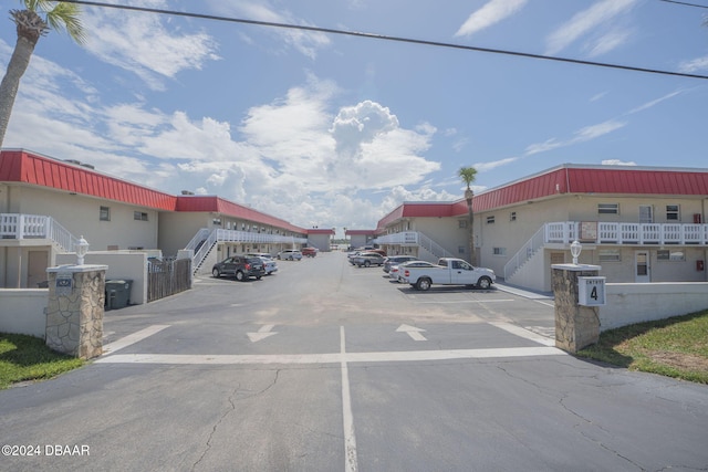 2801 N Halifax Ave N Unit 238, Daytona Beach, FL 32118 - view of asphalt road with stairway