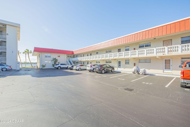2801 N Halifax Ave N Unit 238, Daytona Beach, FL 32118 - view of building exterior with uncovered parking