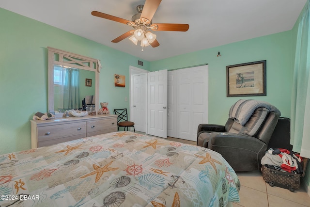 2801 N Halifax Ave N Unit 238, Daytona Beach, FL 32118 - bedroom with tile patterned flooring, a closet, and a ceiling fan
