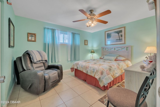 2801 N Halifax Ave N Unit 238, Daytona Beach, FL 32118 - bedroom with light tile patterned floors, baseboards, and ceiling fan