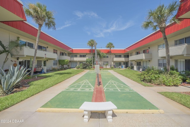 2801 N Halifax Ave N Unit 238, Daytona Beach, FL 32118 - surrounding community with shuffleboard and a lawn