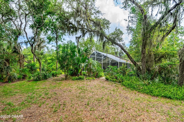 1324 Munster Cir, Ormond Beach, FL 32174 - view of yard featuring a lanai