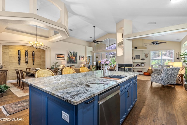 1324 Munster Cir, Ormond Beach, FL 32174 - kitchen featuring blue cabinetry, stainless steel dishwasher, open floor plan, ceiling fan, and dark wood-type flooring