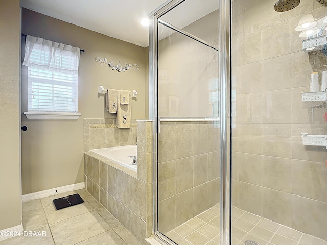 bathroom with plus walk in shower and tile patterned floors