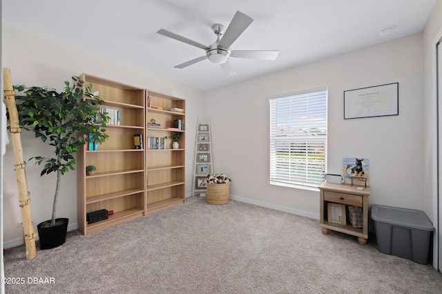2518 Hoptree Ln, Edgewater, FL 32141 - sitting room featuring a ceiling fan, baseboards, and carpet floors