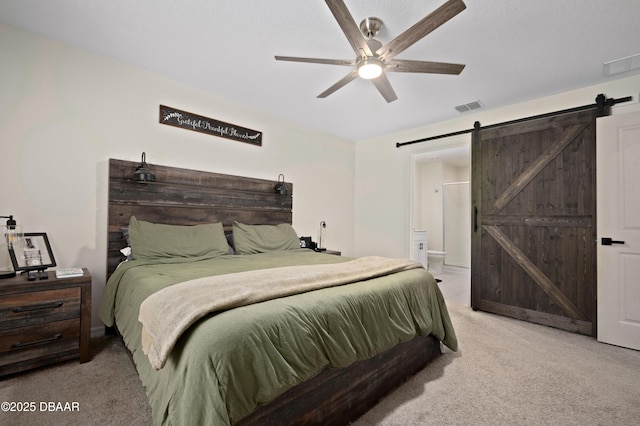 2518 Hoptree Ln, Edgewater, FL 32141 - bedroom featuring a barn door, visible vents, light colored carpet, and ensuite bath