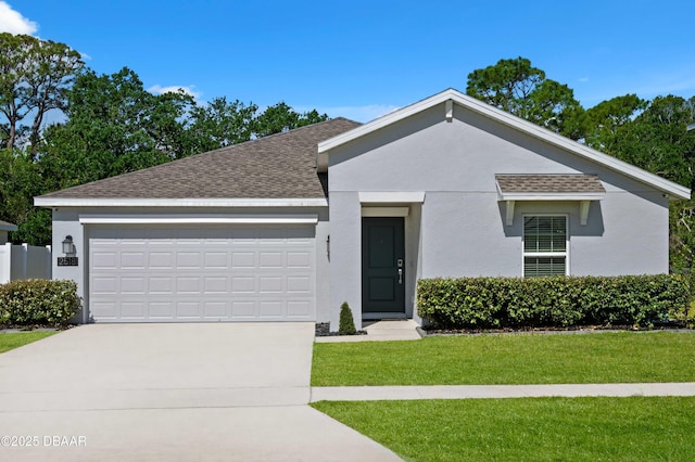 2518 Hoptree Ln, Edgewater, FL 32141 - view of front facade with concrete driveway, roof with shingles, a front yard, and a garage
