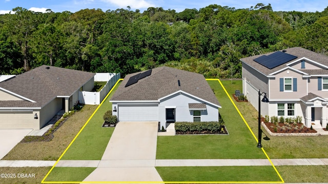 2518 Hoptree Ln, Edgewater, FL 32141 - drone / aerial view featuring a forest view