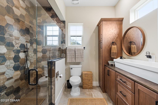 4 Oakview Ct, Palm Coast, FL 32137 - full bathroom featuring toilet, vanity, a shower stall, and baseboards