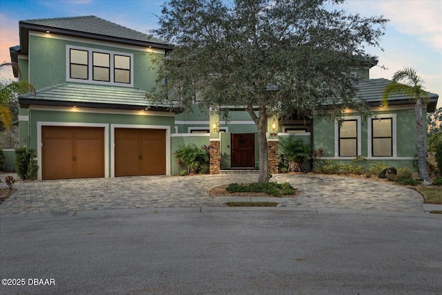 view of front of property featuring a garage