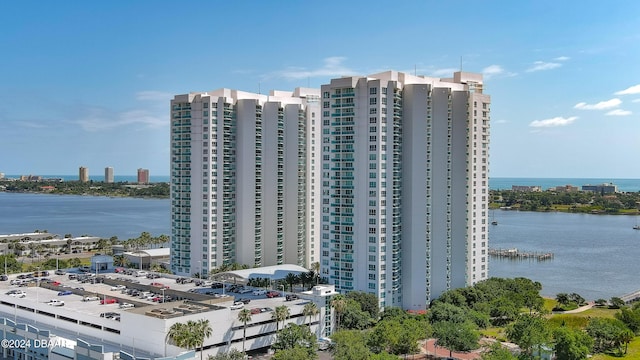 view of building exterior with a water view