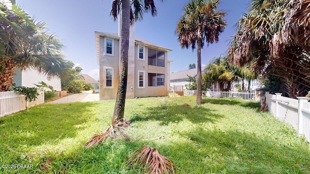 view of yard with a fenced backyard