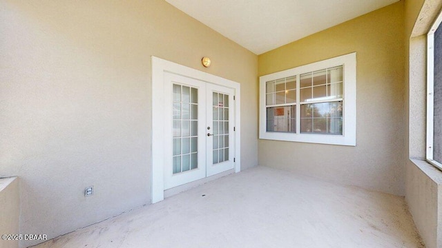 view of patio featuring french doors