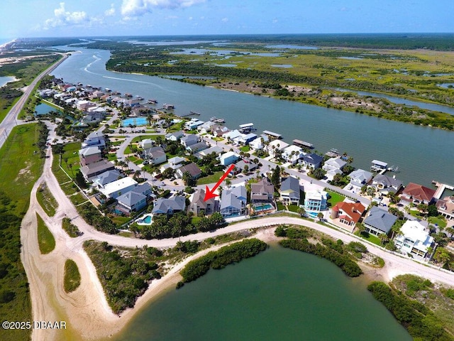 bird's eye view featuring a residential view and a water view