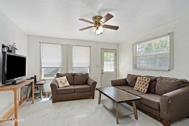 living room featuring ceiling fan