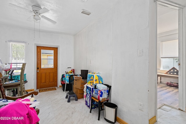 office area with ceiling fan