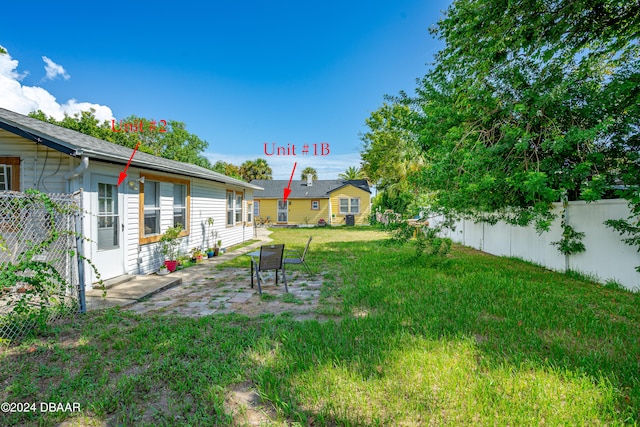 view of yard with a patio area