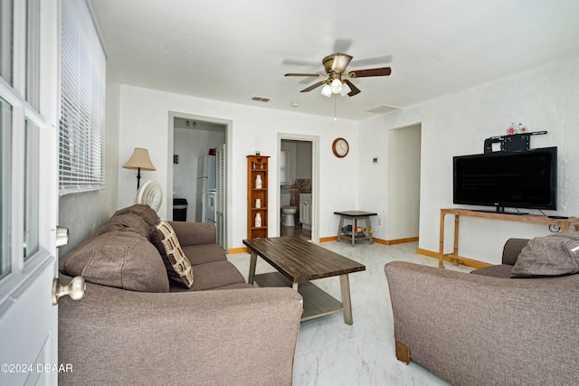 living room with ceiling fan