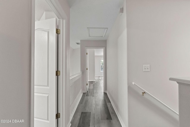 corridor with dark wood-type flooring