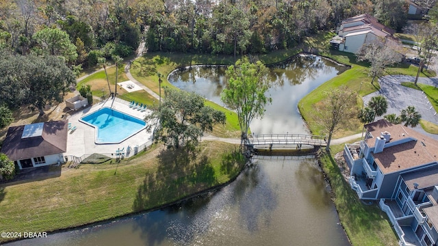 bird's eye view with a water view