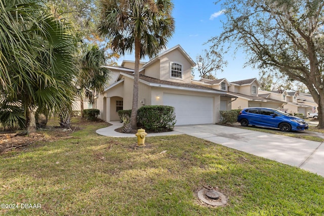 view of front facade featuring a garage and a front lawn