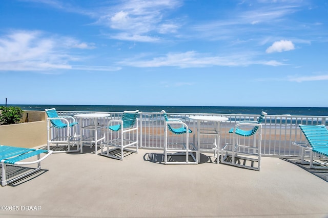 view of patio / terrace with a water view