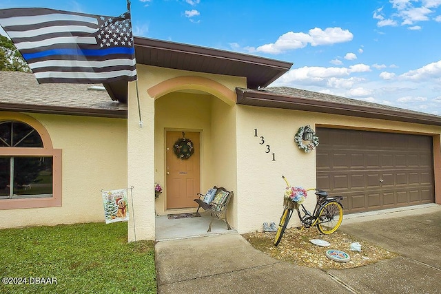 property entrance featuring a garage