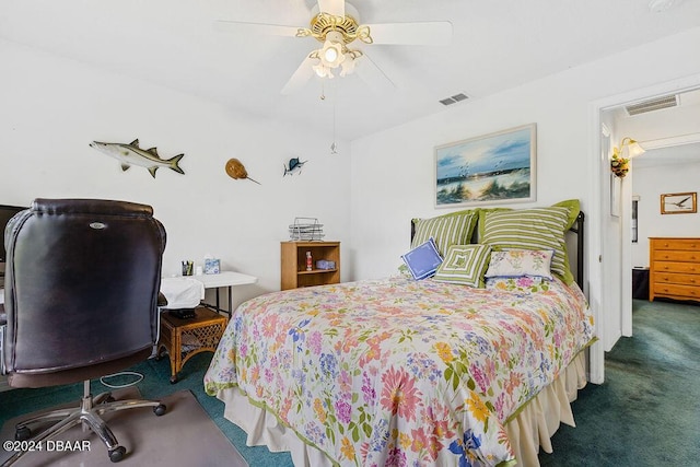 bedroom with ceiling fan and dark carpet