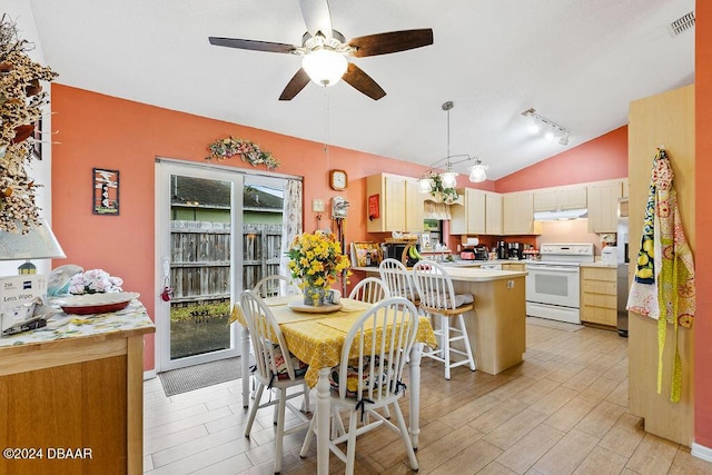 dining area with lofted ceiling and ceiling fan