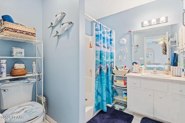 full bathroom with toilet, tile patterned flooring, shower / bath combination with curtain, and vanity