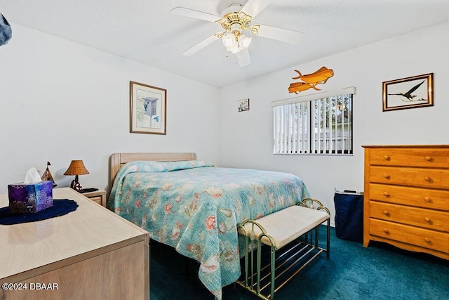 bedroom with dark carpet and ceiling fan